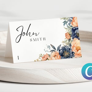 Elegante plantilla de tarjeta de nombre de boda floral melocotón y azul marino moderno, soporte acrílico simple minimalista, descarga digital, conjunto de suite de invitación