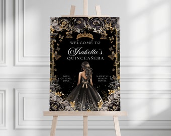 May include: Black and gold Quinceañera welcome sign with a floral border and a silhouette of a woman in a black gown. The text reads "Welcome to Isabella's Quinceañera" and includes the date and location of the event.