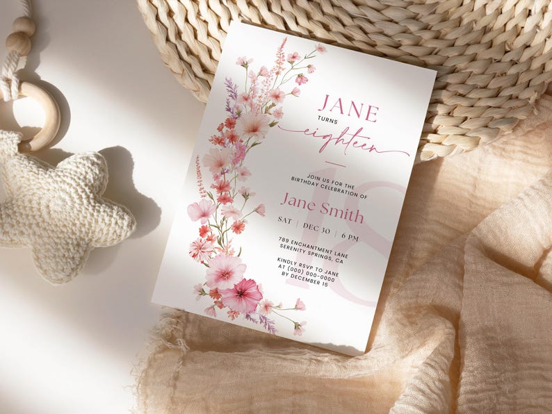 May include: A pink and white floral invitation for an 18th birthday party. The invitation reads "Jane turns eighteen" and includes the text "Join us for the birthday celebration of Jane Smith, Sat Dec 30, 6 PM, 789 Enchantment Lane, Serenity Springs, CA. Kindly RSVP to Jane at (000) 000-0000 by December 15."