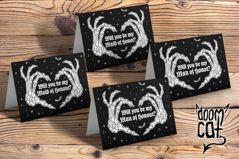 May include: Four black cards with white skeleton hands forming a heart shape. The text on the cards reads "Will you be my Maid of Honor?" and "Will you be my Man of Honor?"