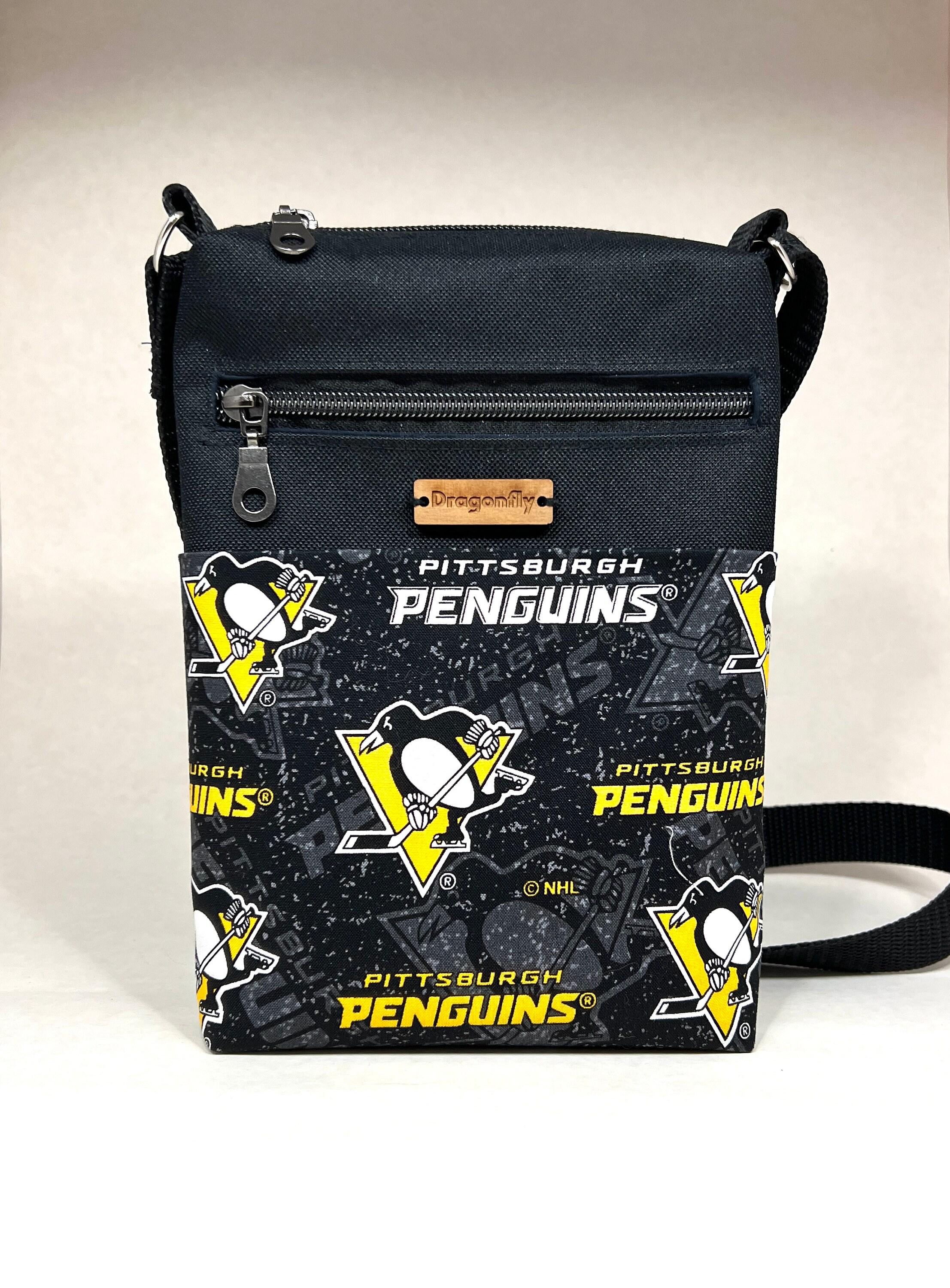 NHL Pittsburgh Penguins Adjustable Crossbody Bag over the