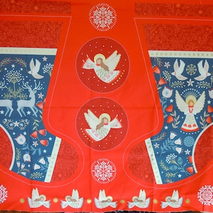 May include: Festive red Christmas stocking fabric with a detailed design. The fabric showcases blue and white reindeer, doves, and angels. The design includes snowflakes and floral elements, ideal for seasonal crafts.