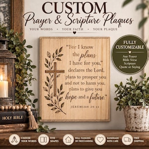 May include: A square wooden plaque featuring the engraved text from Jeremiah 29:11, "For I know the plans I have for you," declares the Lord, plans to prosper you and not to harm you, plans to give you hope and a future, with a cross and leaf design.