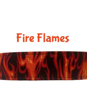 May include: A red and yellow fabric collar with a fire flame pattern. The text "Fire Flames" is above the collar.