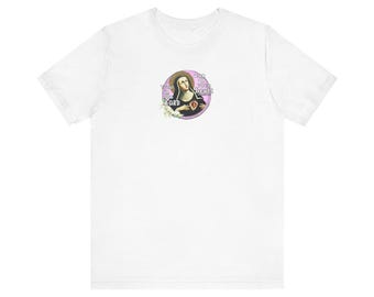 May include: White t-shirt featuring a circular graphic of a religious figure with the words "With the Lord in my heart". The graphic is in a soft, vintage style with a pink and purple border. The shirt is made of a soft, comfortable material.