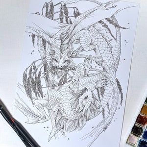 May include: A black and white line drawing of two dragons intertwined around a tree branch. The dragons have detailed scales and intricate facial features. The drawing is on a white background.