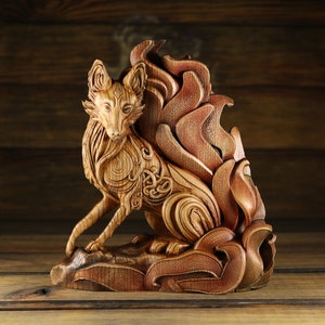 May include: A wooden sculpture of a fox with a detailed, intricate design. The fox is depicted with a bushy tail and a flowing mane, creating a sense of movement and energy. The sculpture is crafted from a single piece of wood and is finished with a natural wood stain.