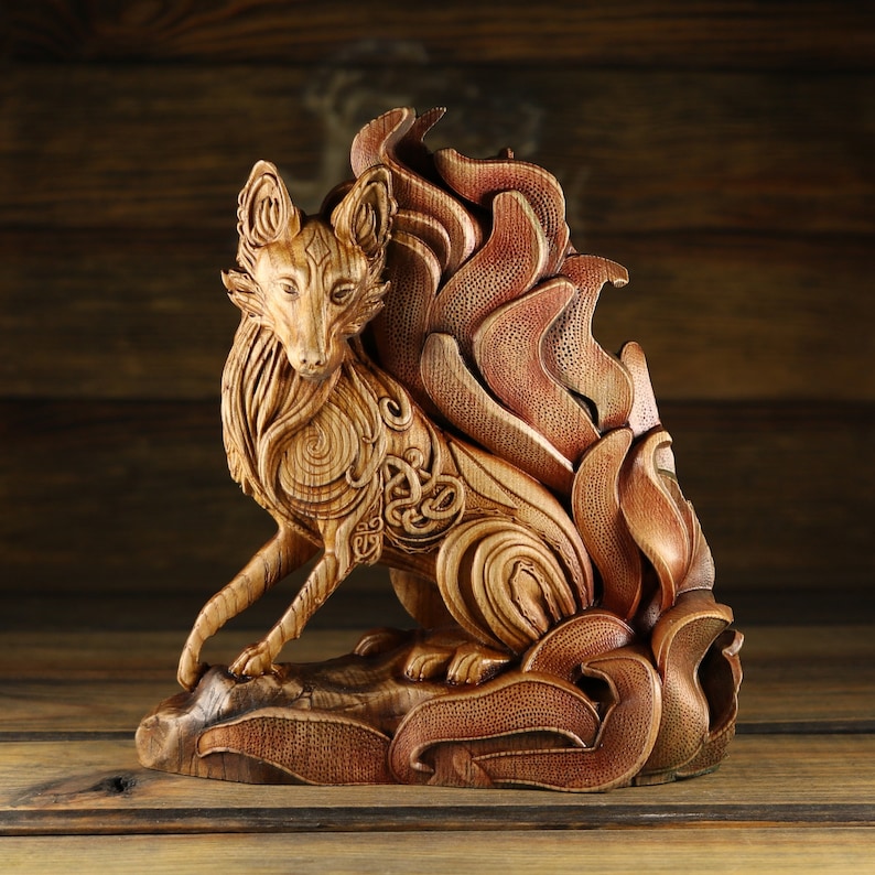 May include: A wooden sculpture of a fox with a detailed, intricate design. The fox is depicted with a bushy tail and a flowing mane, creating a sense of movement and energy. The sculpture is crafted from a single piece of wood and is finished with a natural wood stain.