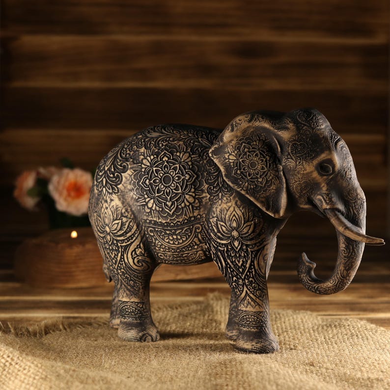 Indian altar shrine totem of an elephant, wooden animal symbolism, dark academia shelf decor sculpture.