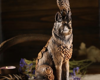 May include: A wooden sculpture of a wolf with a bird perched on its head. The wolf is sitting upright with its paws tucked beneath it. The sculpture is painted in shades of brown and black, with intricate details carved into the wood.