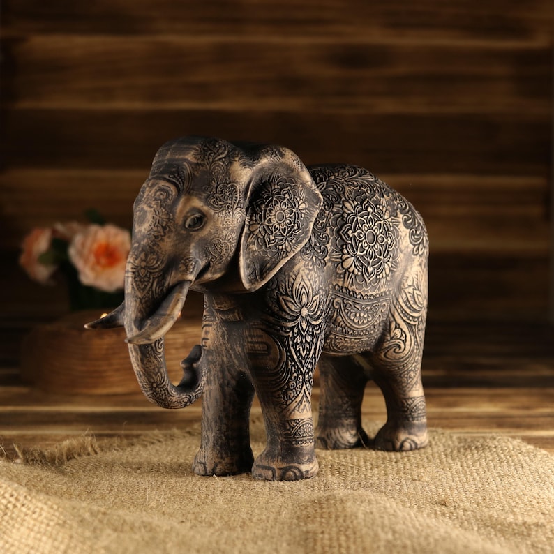 Mythical prosperity statue made of varnished natural wood, unique gift for yoga practitioners and art collectors.