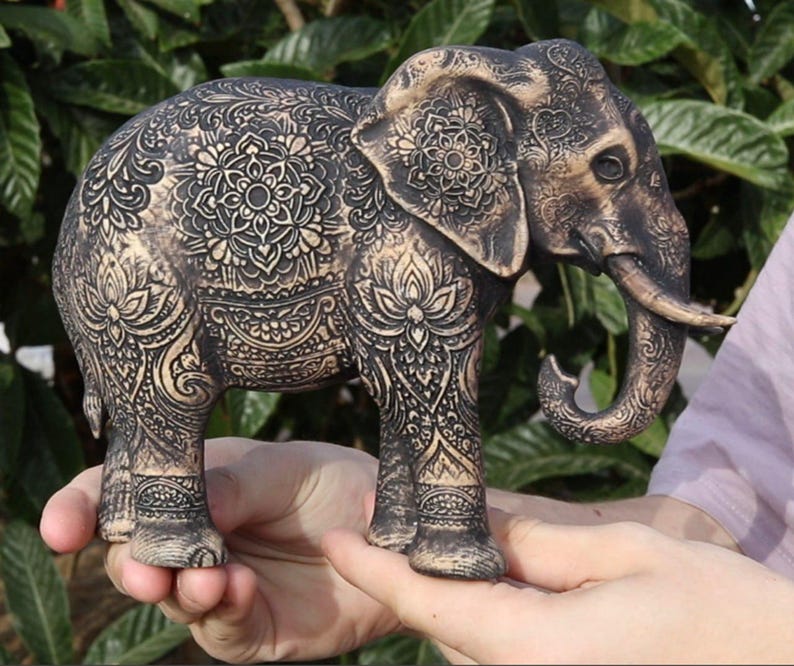 High-end collectible wood sculpture of a sacred Indian elephant, finished with protective clear satin varnish.