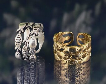 Gift for him and her, Sterling adjustable ring, Swimming Against The Current, School of fish with one gold fish swimming upstream, Unisex