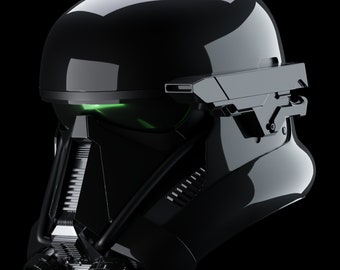 May include: A black helmet with a green visor and a black and silver face mask. The helmet has a sleek, futuristic design.