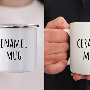 May include: Two mugs, one white enamel mug with the text "ENAMEL MUG" and one white ceramic mug with the text "CERAMIC MUG".