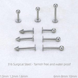 May include: An assortment of silver-colored body jewelry, including barbell and stud styles. The studs have either a ball or cone shape. The text in the image reads "316 Surgical Steel: - Tarnish free and water proof" and lists sizes in millimeters.