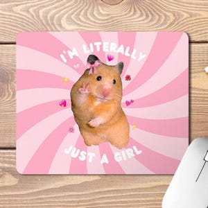 May include: A pink and white swirl background with a hamster wearing a pink bow. The text "I'm literally just a girl" is written in white on the background.