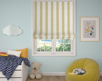 May include: A light blue room with a window featuring a striped Roman shade in white and yellow. The room includes a white cloud-shaped wall decoration, a bed with a striped blanket, and a yellow beanbag chair. A framed picture hangs on the wall.
