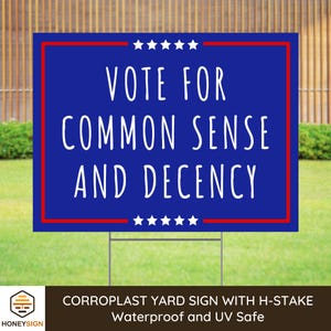 May include: A blue and red political yard sign with white text that reads "Vote for Common Sense and Decency". The sign has a row of stars at the top and bottom. The sign is made of corrugated plastic and is waterproof and UV safe.
