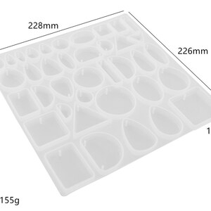 May include: A clear silicone mould with assorted geometric shapes, including squares, circles, and teardrops. The mould measures 22.8cm x 22.6cm x 1.1cm and weighs 155g. Suitable for creating resin jewellery and accessories.
