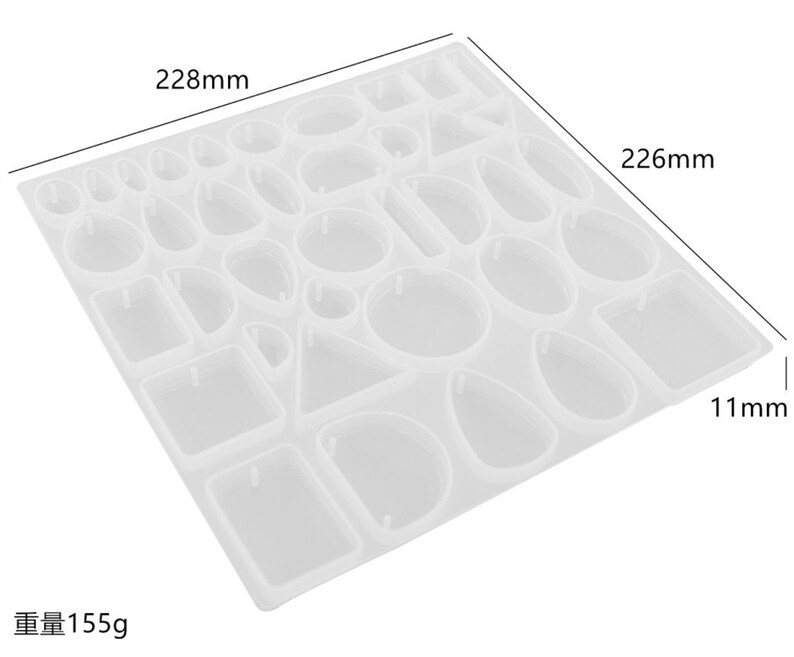 May include: A clear silicone mould with assorted geometric shapes, including squares, circles, and teardrops. The mould measures 22.8cm x 22.6cm x 1.1cm and weighs 155g. Suitable for creating resin jewellery and accessories.