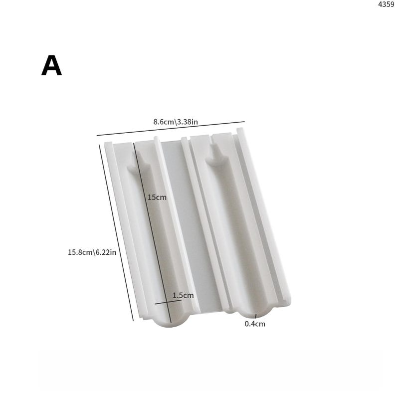 May include: A white rectangular mold with dimensions of 6.22 inches by 3.38 inches. The mold has two parallel channels, each with a curved bottom. The mold is 15 cm long and 1.5 cm wide. The text "A" is in the upper left corner.