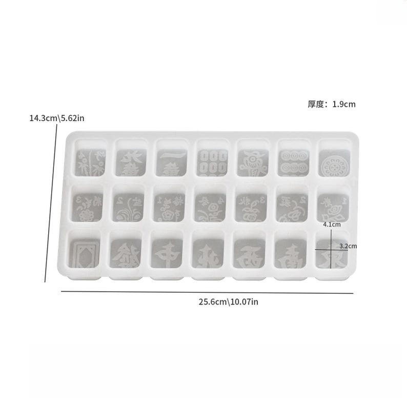 May include: A clear, rectangular silicone mold for crafting, featuring 20 individual square and rectangular compartments. The mold measures 10.07 inches long, 5.62 inches wide, and 0.75 inches thick. Each compartment has a unique embossed design.