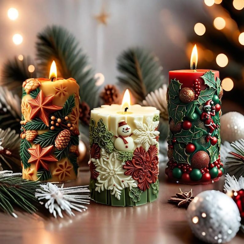 May include: Three lit, decorative Christmas candles. The candles are cylindrical and feature detailed relief designs of stars, pinecones, snowflakes, and a snowman. Colors include red, green, white, and gold. The candles are on a wooden surface with blurred holiday decorations in the background.