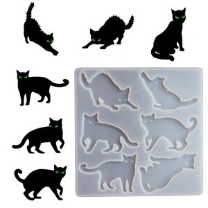 Pode incluir: Silhuetas de gatos pretos com olhos verdes em várias poses, incluindo alongamento e sentados. Também é mostrada uma forma de silicone com formas de gatos. Ideal para decorações de Halloween ou projetos com tema de gato.