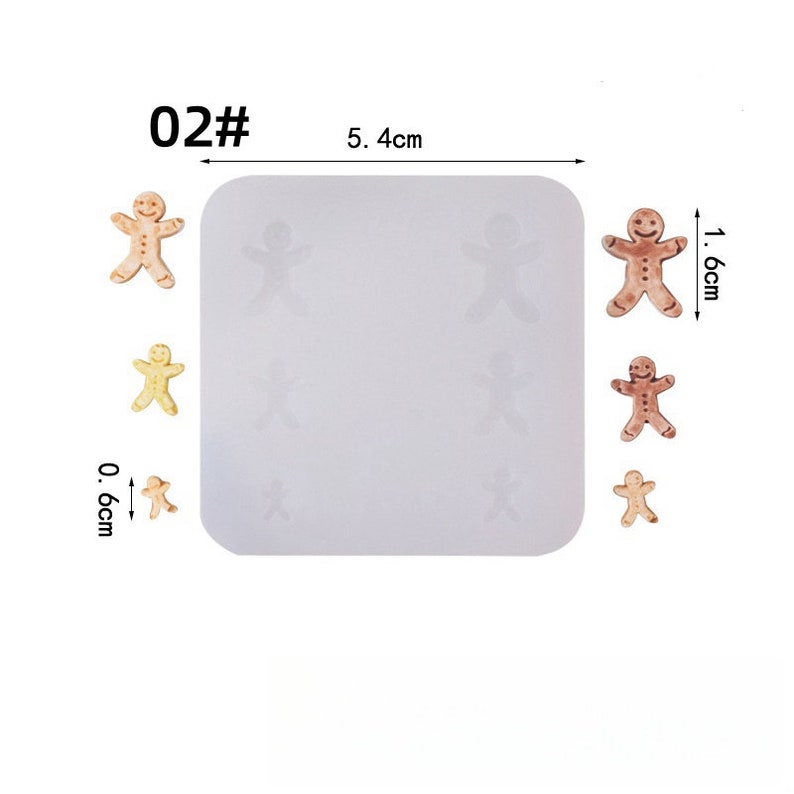 May include: A white silicone mold with six gingerbread man shapes, and three finished gingerbread men. The mold is 5.4 cm wide. The finished gingerbread men are 1.6 cm and 0.6 cm tall. The image has the text "02#".