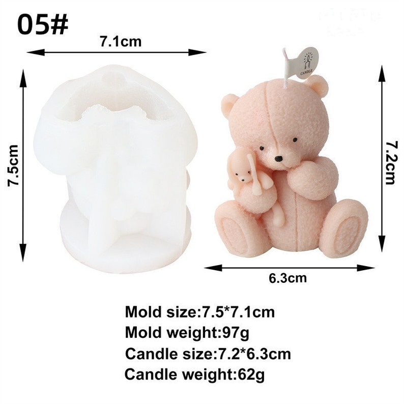 May include: A light pink bear-shaped candle with a smaller bear held in its arms, and a white candle mold. The candle is 7.2 cm tall and 6.3 cm wide. The mold is 7.5 cm tall and 7.1 cm wide.