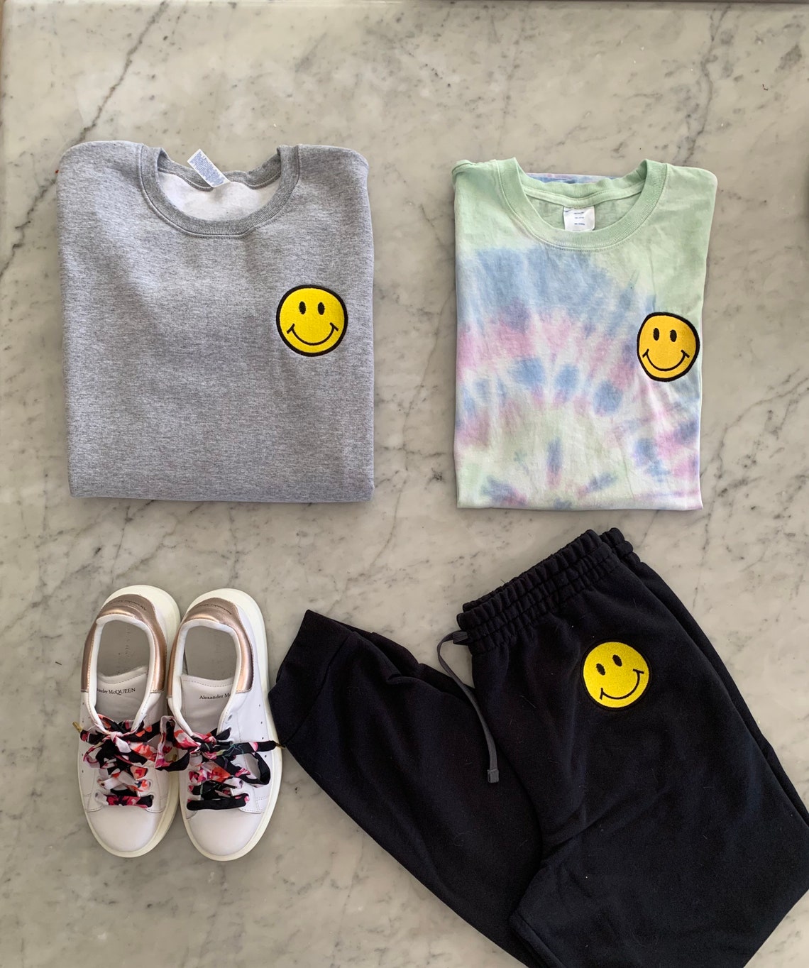 sweatpants with smiley face