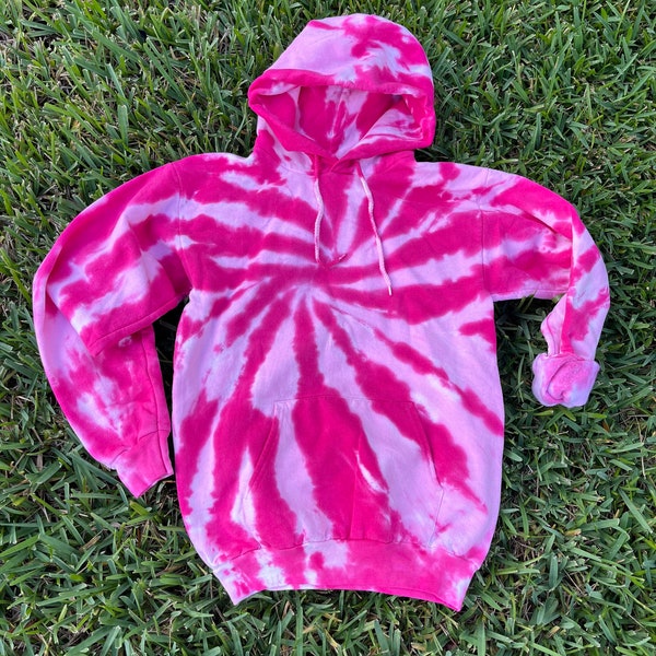 Sudadera con capucha tie dye de color chicle con espiral rosa, unisex. Otros colores tie dye disponibles