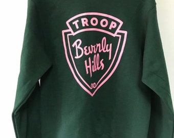 Troop Beverly Hills Movie California Pink and Green.  Phyllis Nefler.  Wilderness Girls.  We dont need stinking patches shirt.