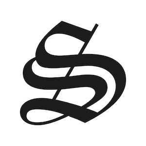 May include: A black, stylized letter "S" in a gothic font. The letter is thick and curved, with a distinctive, ornate design. The background is plain white, providing a strong contrast to the dark letter.