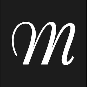 May include: A white, elegant letter "m" in a cursive font against a solid black background. The design features a flowing, stylized script, with a classic and sophisticated aesthetic. The contrast between the white letter and the black backdrop creates a striking visual.