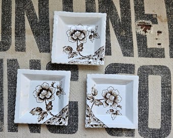 Three Antique Square Brown Butterpats