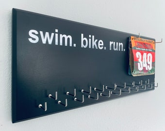 Triathlon Medal Holder / Hanger, gray or black with chrome &quot;swim. bike. run.&quot; vinyl, 21 hooks and BIB holder