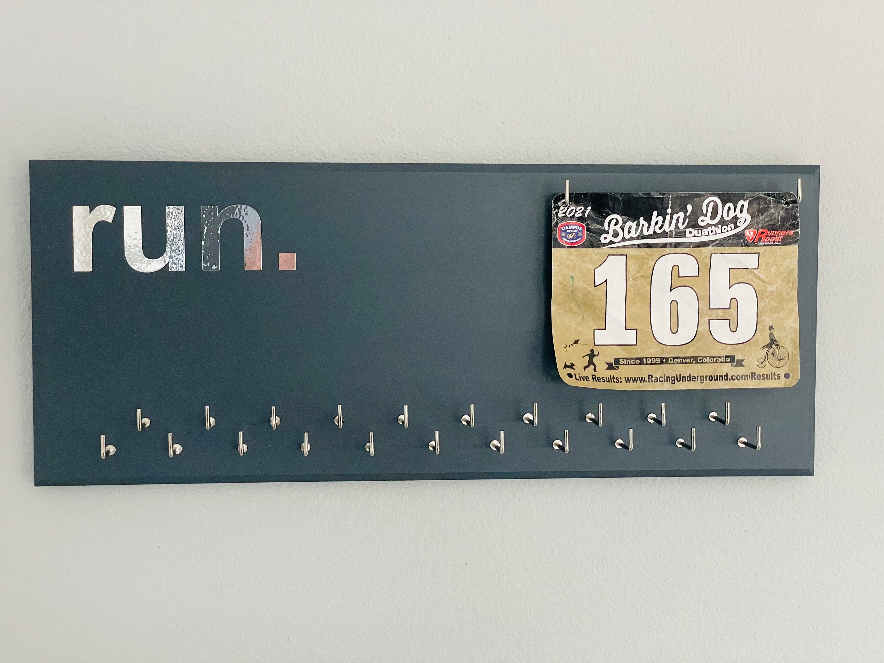 Running Medal Holder, gray or black with chrome "run." vinyl, 21 hooks and BIB holder