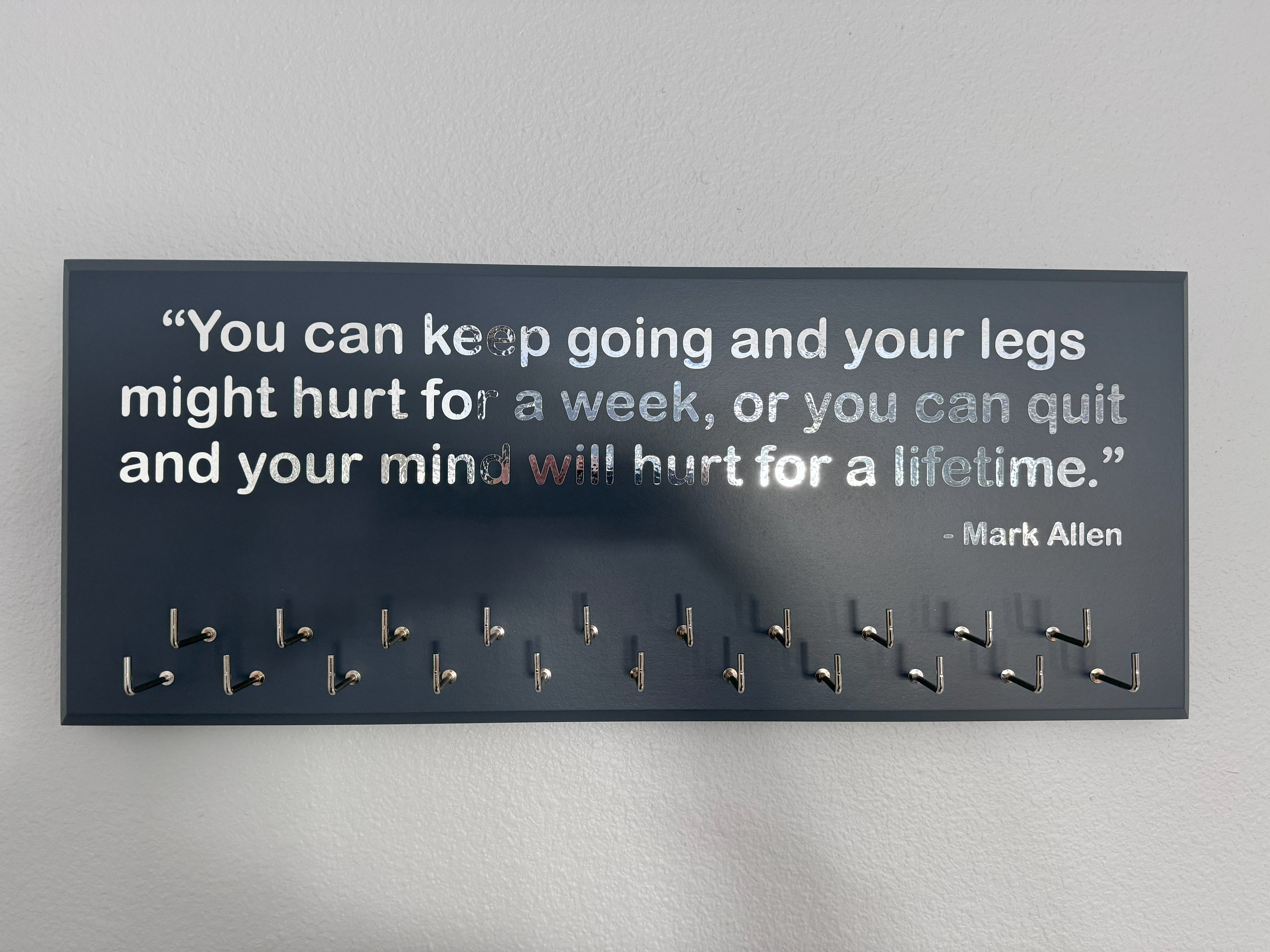 Triathlon / Running Medal Holder, gray or black with chrome Mark Allen quote and 21 hooks
