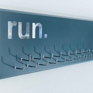 Running Medal Holder, gray with chrome &quot;run.&quot; vinyl, medal hanger with 11 or 21 hooks.