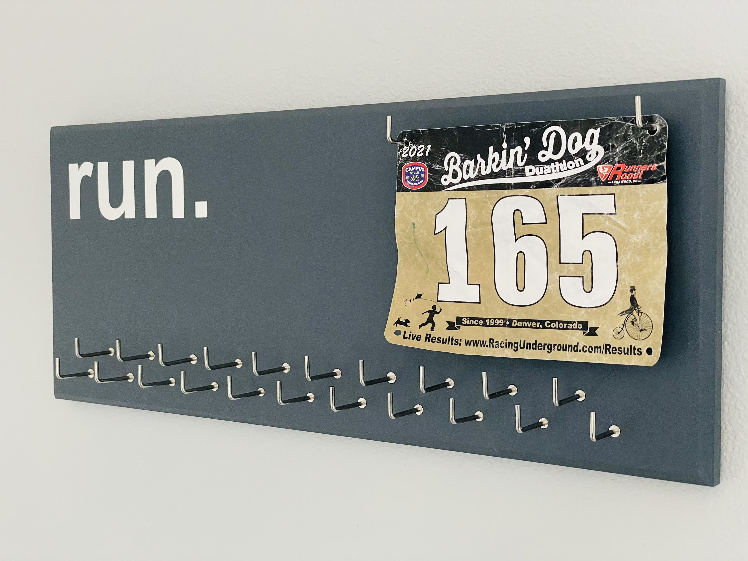 Running Medal Holder, gray or black with chrome "run." vinyl, 21 hooks and BIB holder