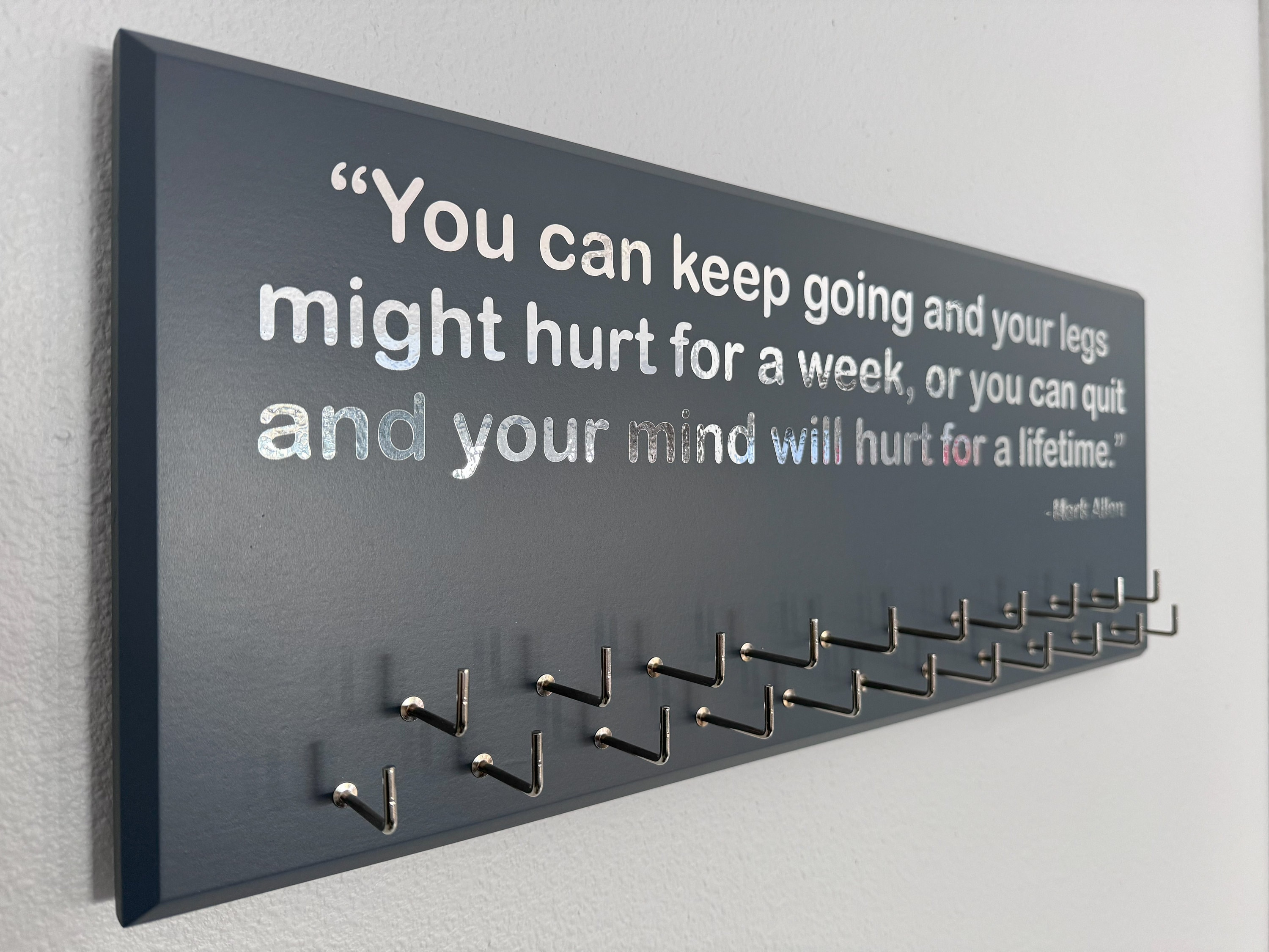 Triathlon / Running Medal Holder, gray or black with chrome Mark Allen quote and 21 hooks