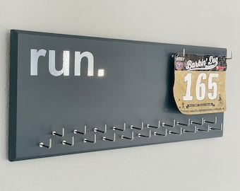 Running Medal Holder, gray or black with chrome "run." vinyl, 21 hooks and BIB holder