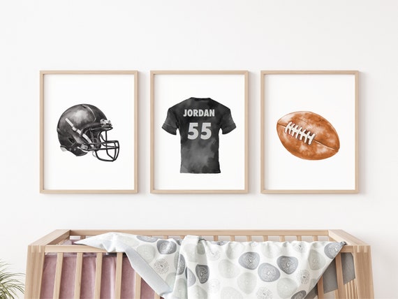 custom football helmet room decor Personalized Name Sign & Ball Cutouts Layer inspired wall sign features a realistic football field background with two opposing helmets facing off Football Wall Decal Custom Football