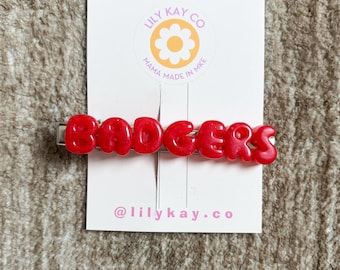 Badgers bubble letter clip