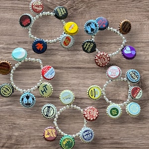 Vintage Vibes: One-of-a-kind stretch bracelet featuring 6 unique bottle caps.