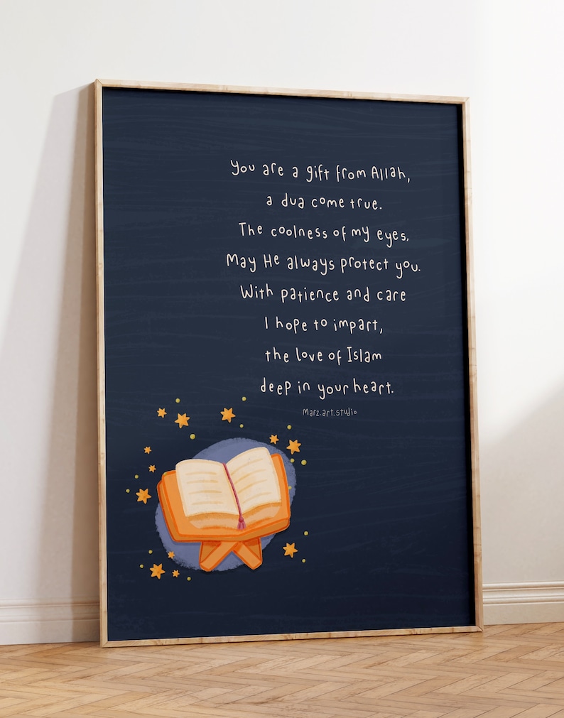 May include: A dark blue poster with a white quote about Islam and a cartoon illustration of an open book on a stand with stars in the background. The quote reads: "You are a gift from Allah, a dua come true. The coolness of my eyes. May He always protect you. With patience and care I hope to impart, the love of Islam deep in your heart. Marz.art.studi"
