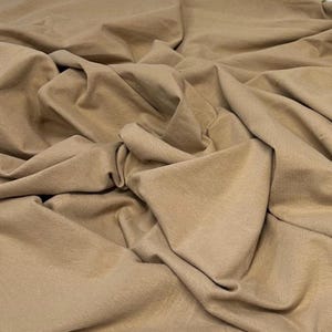 Tecido de malha jersey de algodão e elastano ultra macio com elasticidade em 4 direções, vendido por metro, 200 g/m², para body modelador. Cor natural. Khaki