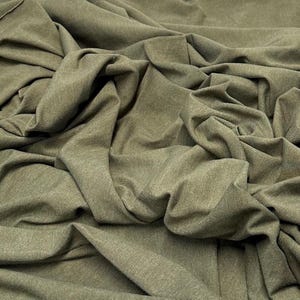 Tecido de malha jersey de algodão e elastano ultra macio com elasticidade em 4 direções, vendido por metro, 200 g/m², para body modelador. Cor natural. Olive